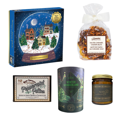 Winter Indulgence holiday gift box with luxury herbal tea, peppermint chocolates, salted caramel cashew treats, a festive candle and a choice of holiday puzzle.