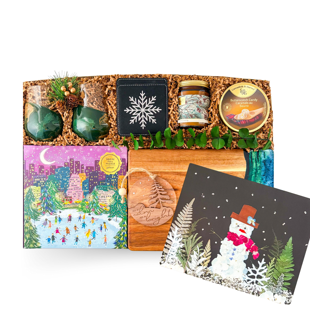 Winter Luxe XL premium holiday gift box with jade and gold glasses, graze board, candle, and snowflake coasters