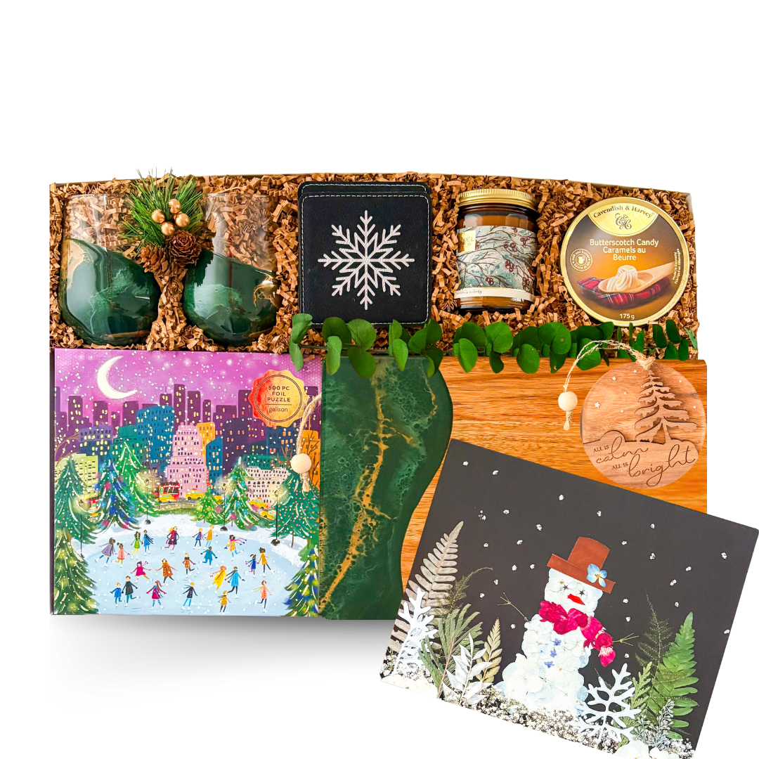 Winter Luxe XL premium holiday gift box with jade and gold glasses, graze board, candle, and snowflake coasters