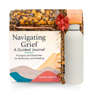 With Sympathy comfort gift box featuring a guided grief journal, calming candle, insulated bottle, gourmet snacks, and supportive self-care items curated by Black Bow Gift Co.