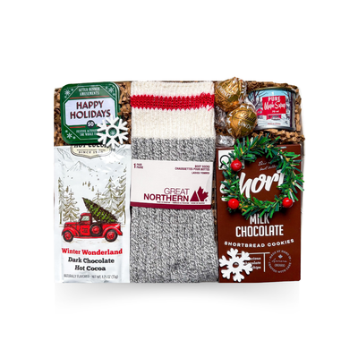 Snow Day winter gift box featuring cozy knit socks, dark chocolate hot cocoa, maple syrup, milk chocolate shortbread cookies, chocolates and holiday activity tin.