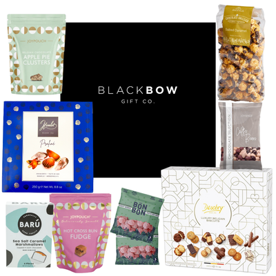 Sweet Moments black mailer gift box with chocolates, candy, and biscuits for small to medium groups