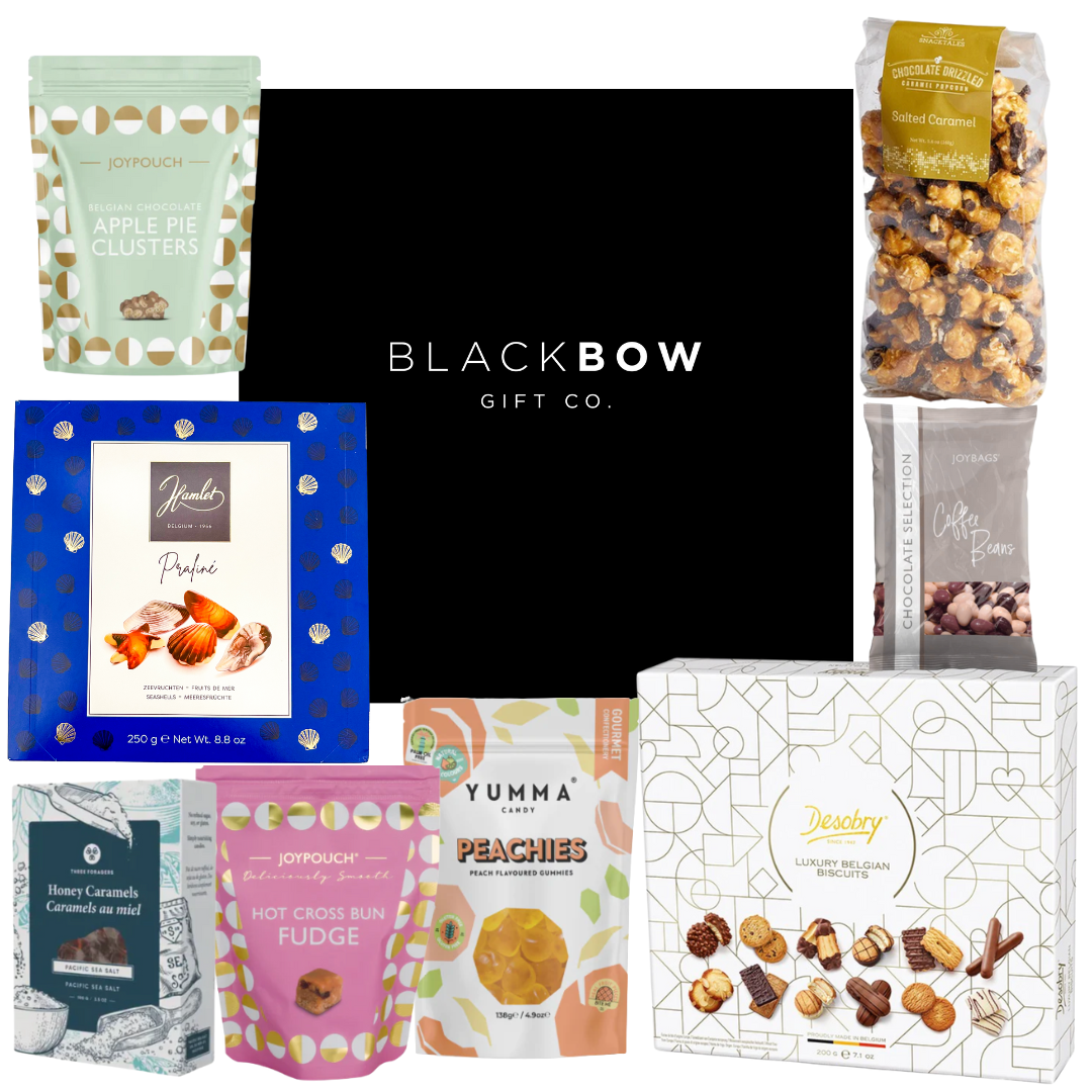 Sweet Moments black mailer gift box with chocolates, candy, and biscuits for small to medium groups