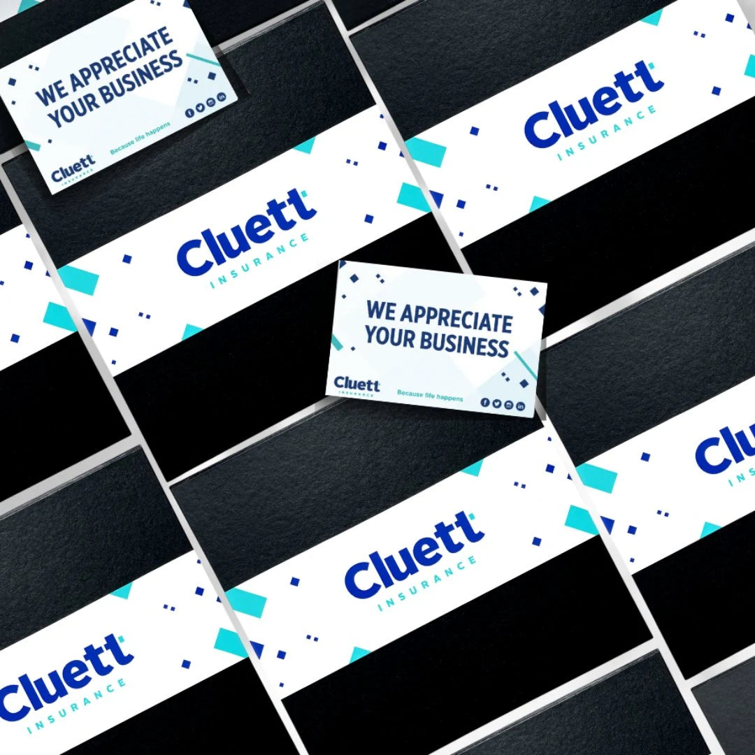 Black boxes with custom Cluett “We appreciate your business” belly bands.